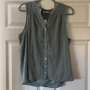NFS Sleeveless teal blouse with stitching detail